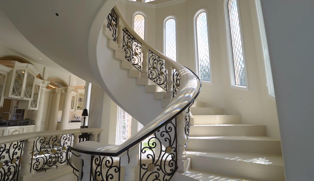 Glass and metal railing on a modern staircase