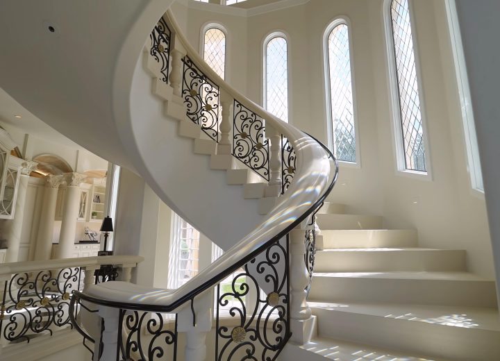 Glass and metal railing on a modern staircase