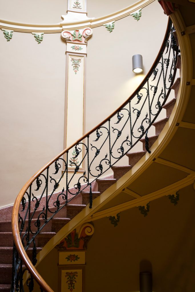 Wrought iron railing detail in a stairwell