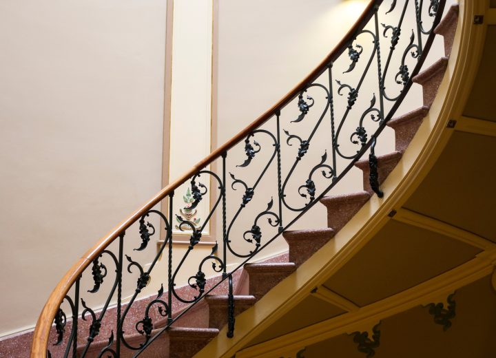Wrought iron railing detail in a stairwell